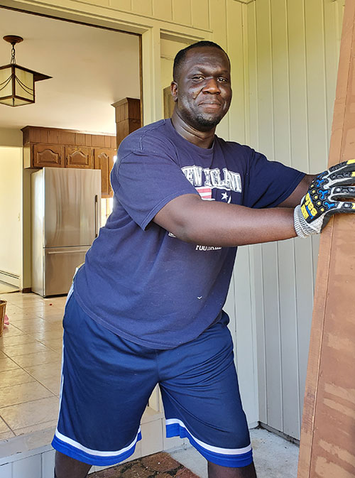 man moving furniture